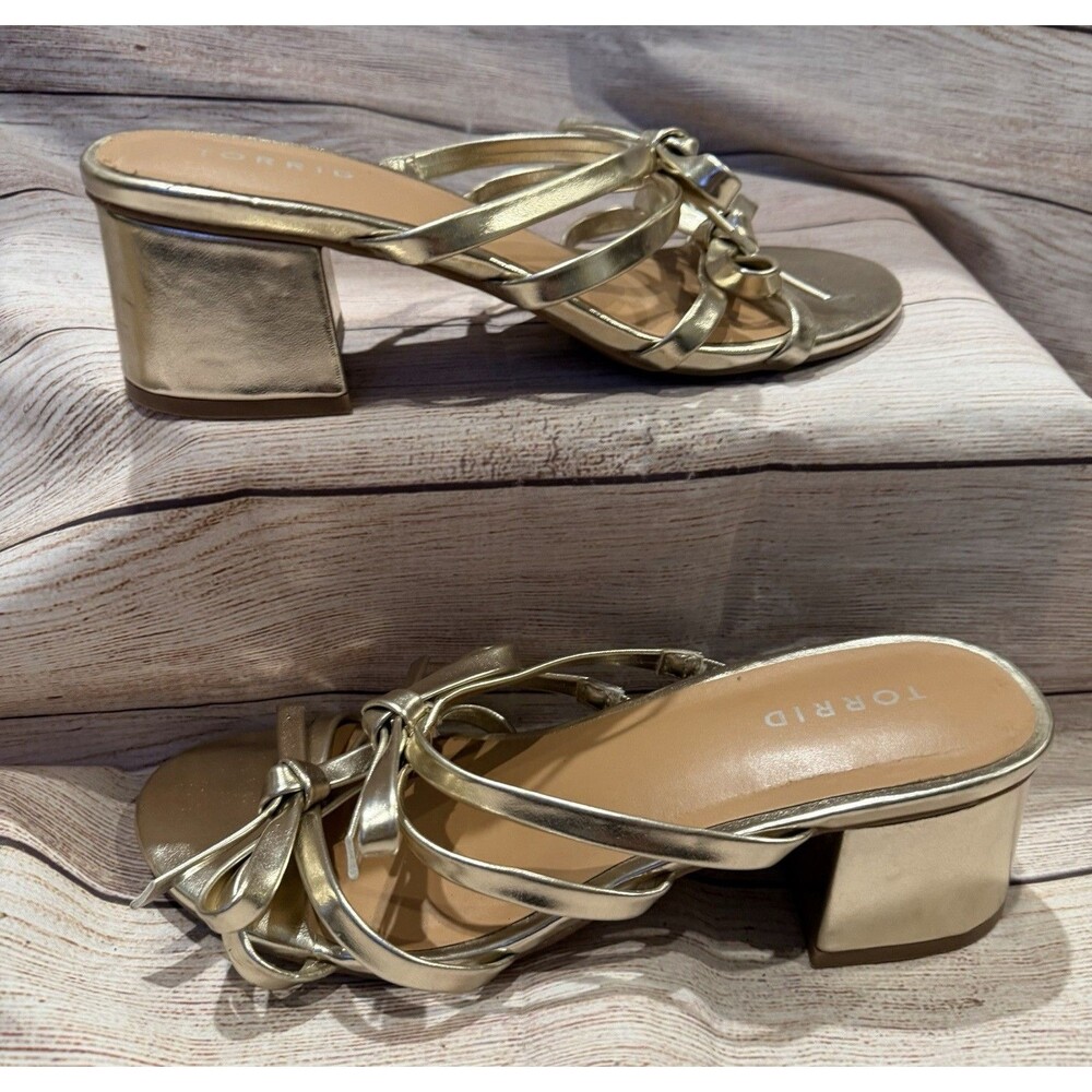 Torrid gold strappy low block-heel sandals feature delicate decorative bows 9WW